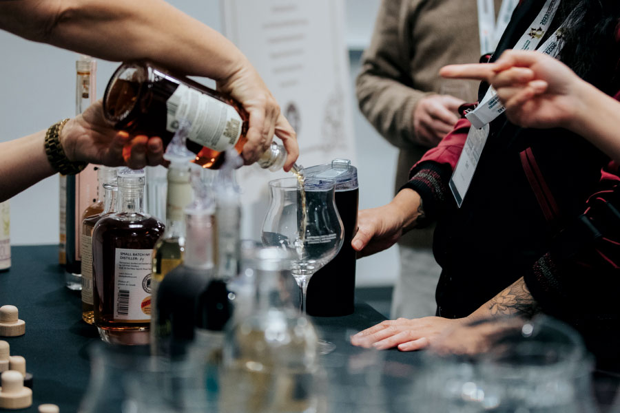 Tight shot of sample being poured in glass