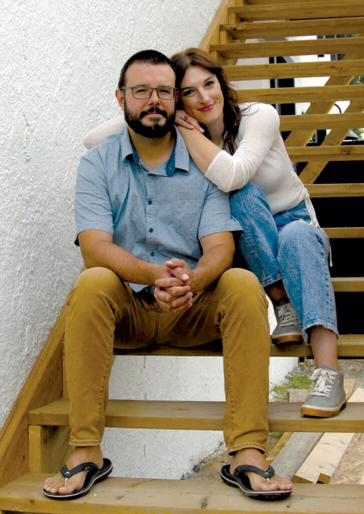 Graeme Maclean and Kristin MacCary sitting on stairs