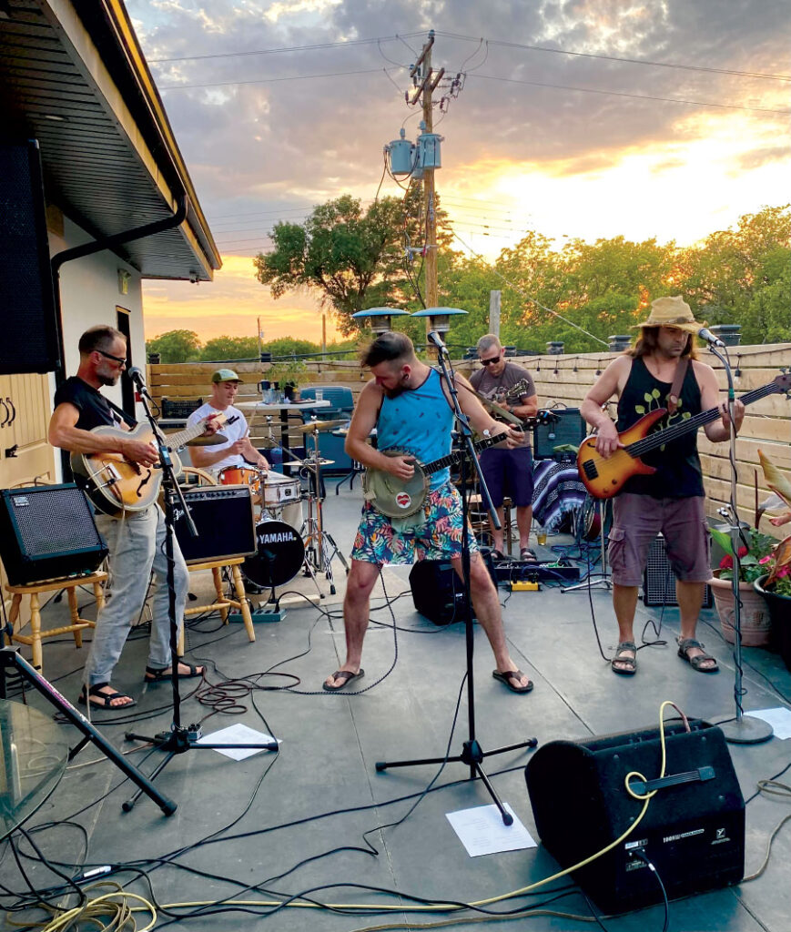 Band performing on outside patio