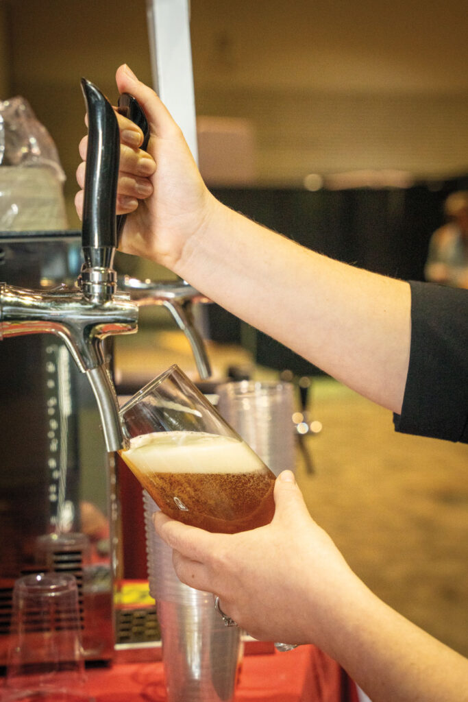 Beer being poured in to a glass