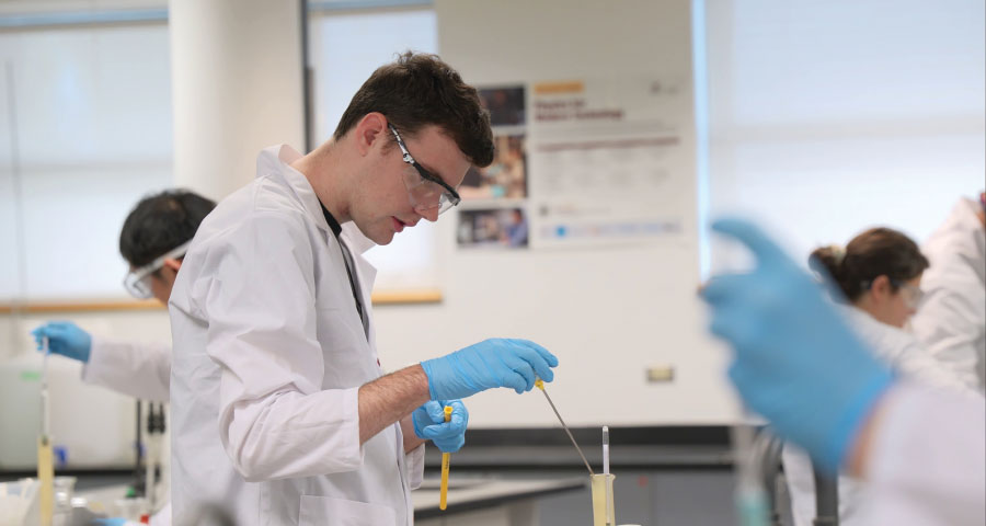 Student in lab coat