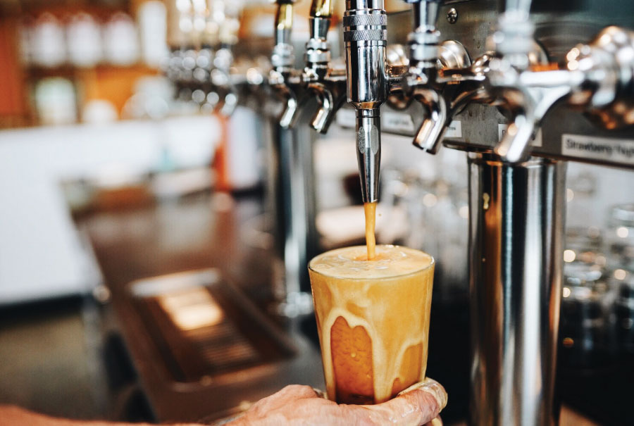 Beer overflowing from tap